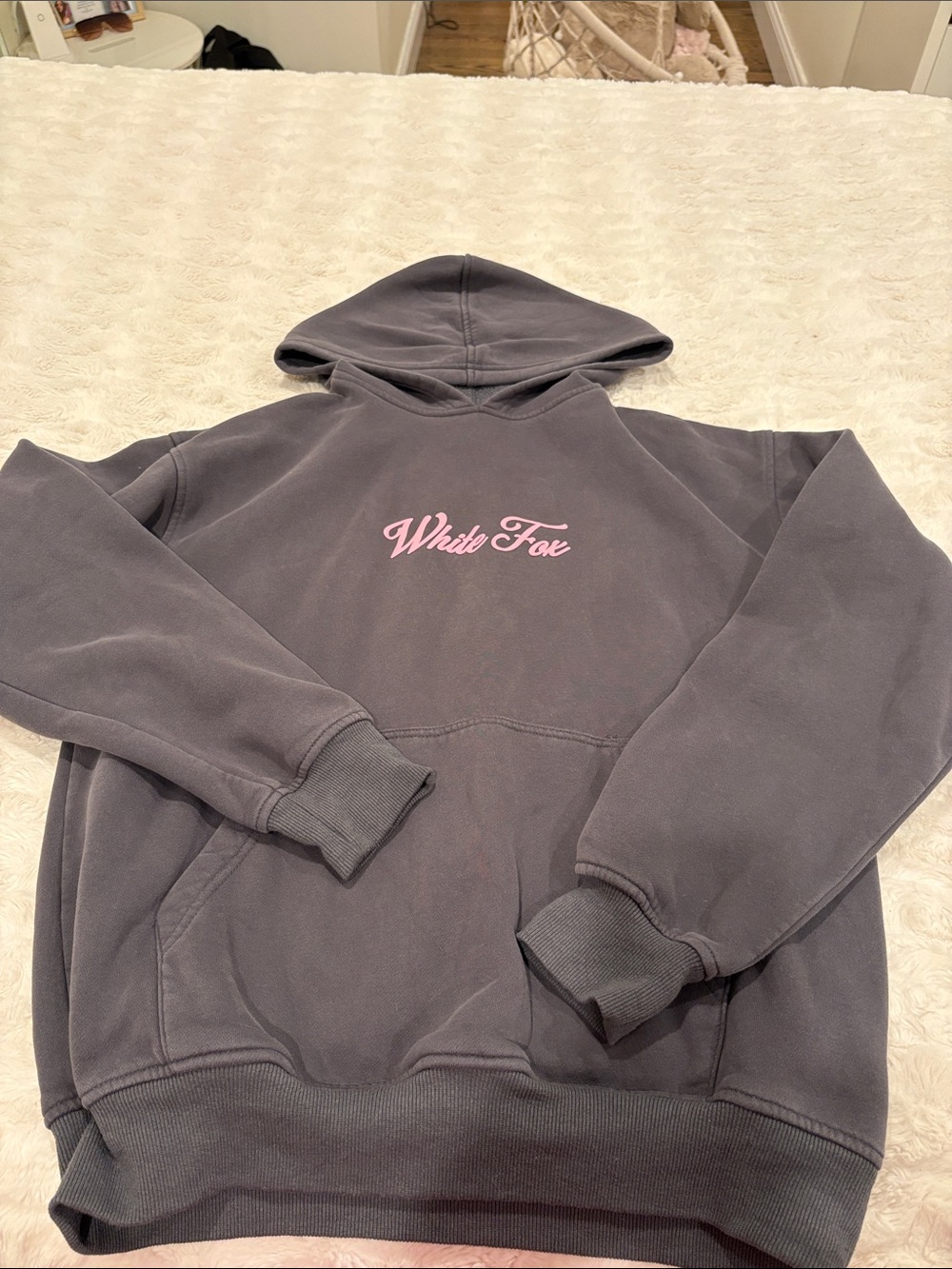 white fox hoodie with pink writing